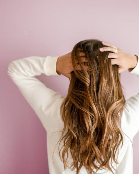 Long hair styled from behind at Scarlett Hairlosophy salon